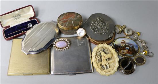 A silver cigarette case and a group of items including an ivory brooch and jewellery.